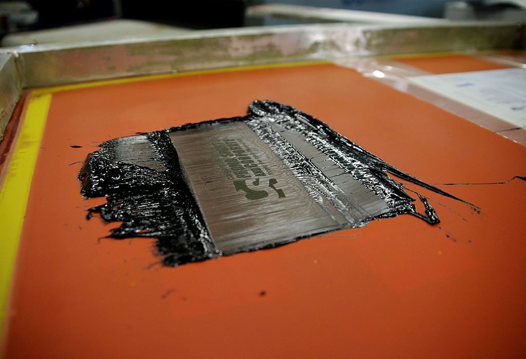 calgary silkscreen logo being slikscreened